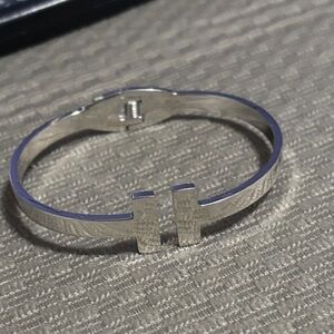 Silver Tone fashion icon Bracelet